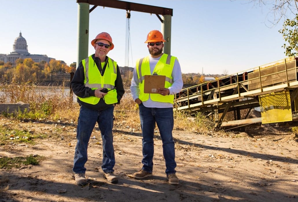 Two Capital Aggregates employees at a river terminal